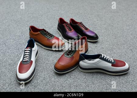 Several models of male shoes. Elegant modern boots for men Stock Photo