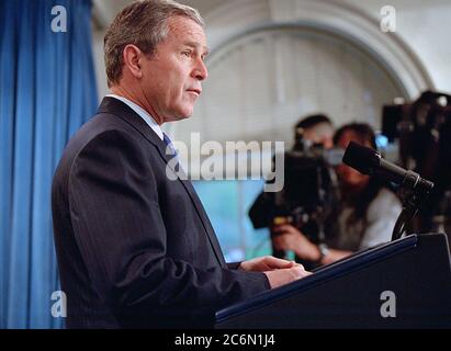 President George W. Bush delivers a statement on the expected release of 24 American servicemen April 11, 2001, in the press briefing room of the White House. Stock Photo