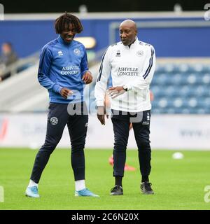 Eberechi Eze of QPR and Head of Coaching Chris Ramsey share a joke during the EFL Sky Bet Championship match between Queens Park Rangers and Fulham at The Kiyan Prince Foundation Stadium, London, England on 30 June 2020. Photo by Ken Sparks. Editorial use only, license required for commercial use. No use in betting, games or a single club/league/player publications. Stock Photo