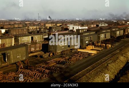 Freight cars being maneuvered in a Chicago and Northwestern [i.e. North Western] railroad yard, Chicago, Ill. December 1942 Stock Photo