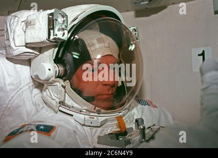 (11-21 Feb. 1997) --- Attired in the Extravehicular Mobility Unit (EMU) spacesuit, astronaut Mark C. Lee, payload commander, is in the airlock Discovery preparing for one of five STS-82 space walks. The sessions of extravehicular activity (EVA), of which Lee eventually participated in three, were conducted in order to service the Hubble Space Telescope (HST), temporarily latched in Discovery's payload bay. Stock Photo