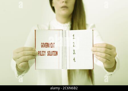 Word writing text Government Policy Solution. Business photo showcasing designed game plan created in response to emergency disaster Model displaying Stock Photo