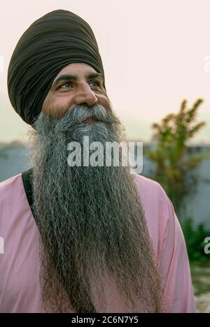 Portrait long bearded Sikh Granthi Fatehgarh Sahib Punjab India Stock Photo