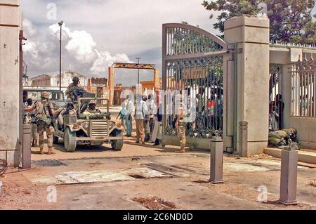 1992 - US Marines enter the main gate at the embassy compound in Mogadishu Somalia