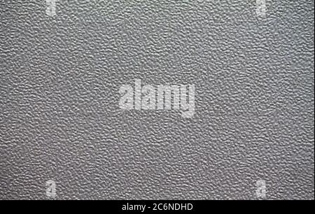 Texture of an aluminum roller shutter in a factory building. Stock Photo