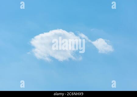 Small clouds on the blue sky at day time. Stock Photo