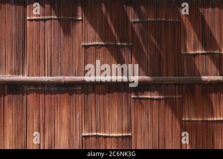 Traditional Japanese garden fence made of bamboo Stock Photo