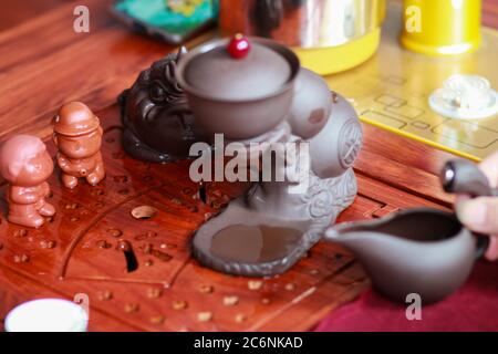 Tea set on a wooden tea tray Stock Photo