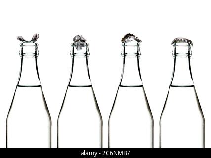 Glass water bottles with wrinkle locks on the top Stock Photo