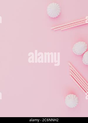 Sweet marshmallow with straws isoated on pink background. Flat lay. Top view Stock Photo