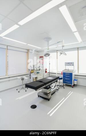 Medical  a clean white surgical OR Operating room for out patient surgery Stock Photo