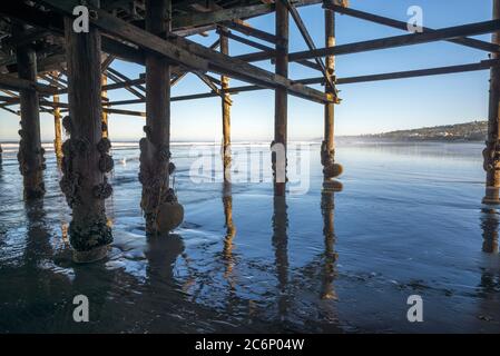 View from under Crystal Pier at Mission Beach on a summer morning. San Diego, California, USA. Stock Photo