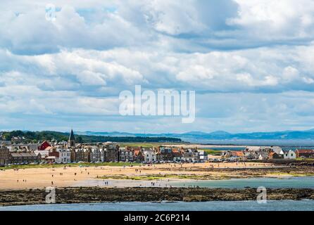 North Berwick, East Lothian, Scotland, United Kingdom, 11th July 2020. UK Weather: a very breezy sunny day in the seaside town along the shore of the Firth of Forth. The town is very busy with visitors Stock Photo