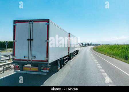 Mega-truck or Road train, special vehicle consisting of a truck and two trailers approved to transport 60 tons. Stock Photo