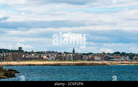 North Berwick, East Lothian, Scotland, United Kingdom, 11th July 2020. UK Weather: a very breezy sunny day in the seaside town along the shore of the Firth of Forth. The town is very busy with visitors Stock Photo