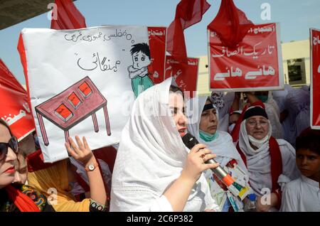 Peshawar, Pakistan. 11th July, 2020. Awami National Party women activists stage protest rally against price hike near Peshawar press club on Saturday. (Photo by Hussain Ali/Pacific Press) Credit: Pacific Press Agency/Alamy Live News Stock Photo