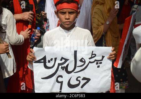 Peshawar, Pakistan. 11th July, 2020. Awami National Party women activists stage protest rally against price hike near Peshawar press club on Saturday. (Photo by Hussain Ali/Pacific Press) Credit: Pacific Press Agency/Alamy Live News Stock Photo