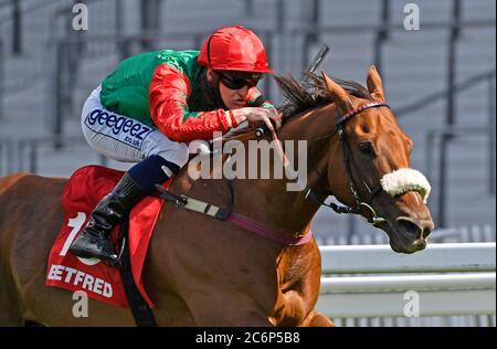 Jawwaal ridden by Callum Rodriguez wins the Betfred Heritage Handicap Stakes at Ascot Racecourse, Berkshire. Stock Photo