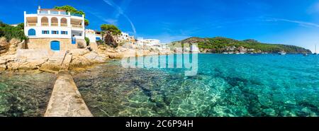 Mediterranean Sea seascape panorama with boats at bay coast beach of Sant Elm on Majorca, Spain Balearic Islands Stock Photo