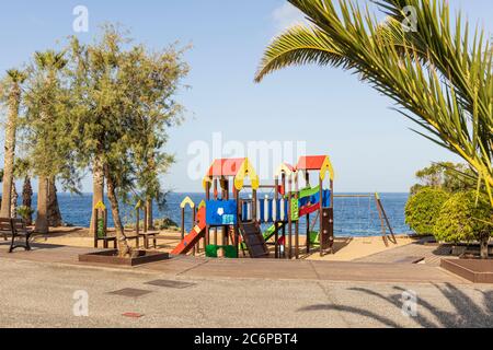 Colourful childrens play ground at La Jaquita, Alcala, Tenerife, Canary Islands, Spain Stock Photo