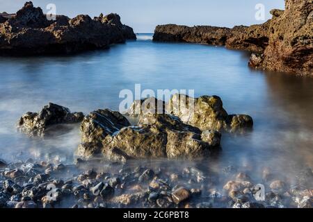 Seawater swimming pools in the rocks on the coast at La Jaquita, Alcala, Tenerife, Canary Islands, Spain Stock Photo