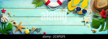 Beach Accessories On Mint Green Plank - Summer Background Stock Photo