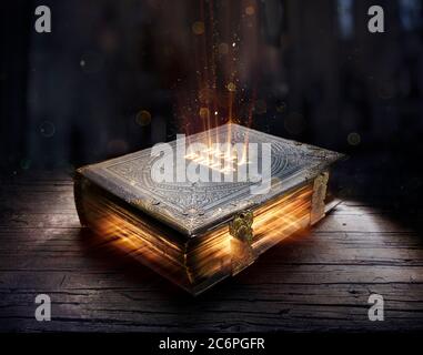 Shining Holy Bible - Ancient Book On Old Table Stock Photo