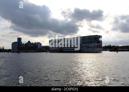 Amsterdam industrial harbor area close by center seen from the river Stock Photo