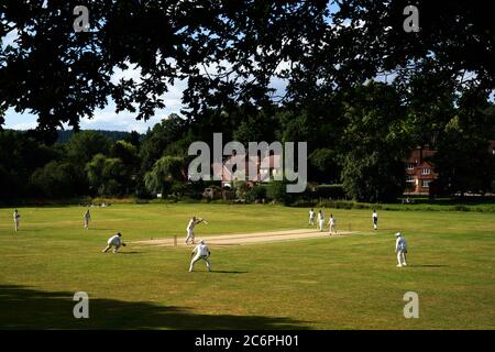 Abinger Hammer Cricket Club play Worplesdon and Burpham cricket club, Surrey. Stock Photo