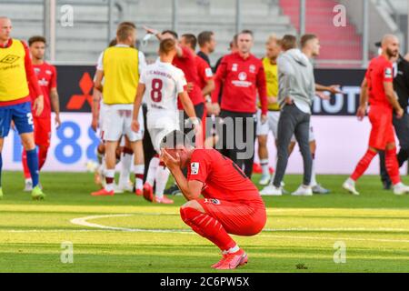Ingolstadt, Deutschland. 11th July, 2020. firo Football: Football: 11.07.2020 Relegation game Relegation 2020 to 2.Bundesliga FC Ingolstadt 04 - FC Nuremberg 3: 1 Ruckspiel FC Ingolstadt 04, whole figure, disappointment, disappointed, at the ground DFB/DFL regulations prohibit any use of photographs as image sequences and/or quasi-video., Oliver STRISCH/pool/via/firosportphoto | usage worldwide Credit: dpa/Alamy Live News Stock Photo