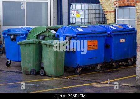 Line of large commercial wheelie bins Stock Photo