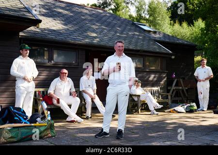 Abinger Hammer Cricket Club play Worplesdon & Burpham cricket club, Surrey. Stock Photo