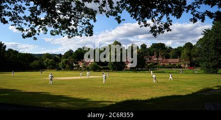 Abinger Hammer Cricket Club play Worplesdon & Burpham cricket club, Surrey. Stock Photo