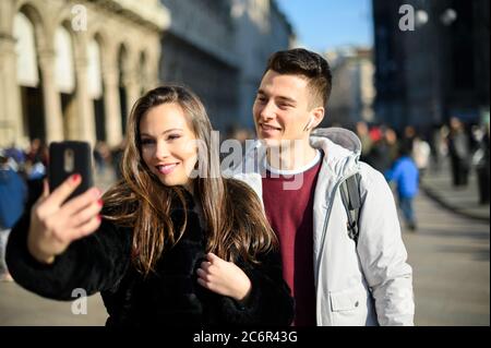 Couple of turists taking a selfie in the city Stock Photo