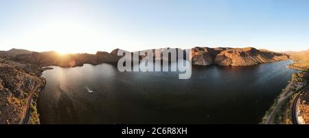 Aerial panorama of Canyon Lake, just outside of Phoenix, Arizona. Image was taken in the evening in late Spring. Stock Photo