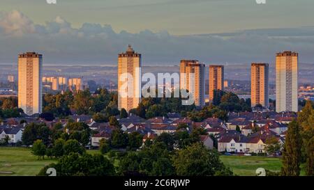 Glasgow, Scotland, UK 12th July, 2020: UK Weather: Candy stripe dawn over the scotstoun towers and the skyscrapers to the south of the city. Credit: Gerard Ferry/Alamy Live News Stock Photo