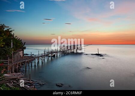 Trabocchi Coast, Chieti, Abruzzo, Italy: landscape of the Adriatic sea coast at dawn with a traditional Mediterranean fishing hut trabocco Stock Photo