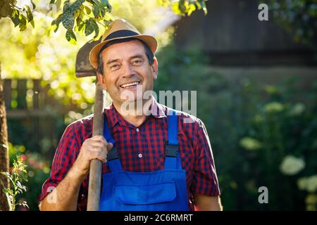 gardener with spade Stock Photo