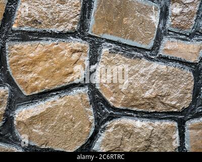 Decorative wall made of stone blocks. Abstract stonewall background. Stock Photo