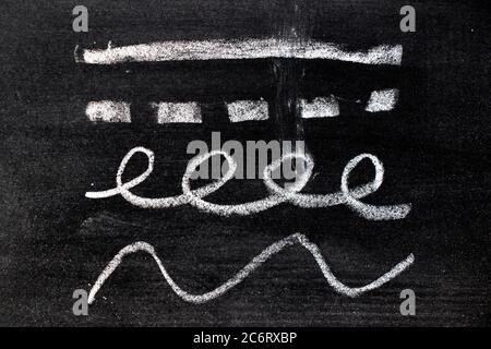 White chalk hand drawing in set of line shape on blackboard background Stock Photo