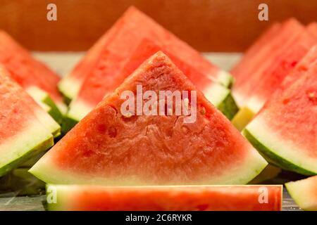 Slices of watermelon on a breakfast buffet, with a shallow depth of field Stock Photo