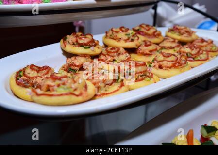 Mini pizza’s at a kid’s birthday party. Stock Photo