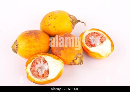 Betel nut is used in industrial textile dyes on white background isolated Stock Photo