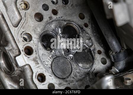 Close up cylinder head car of engine is broken. Stock Photo