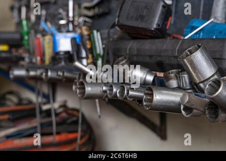 Close up A lot of socket wrench and tools at mechanic shop. Stock Photo