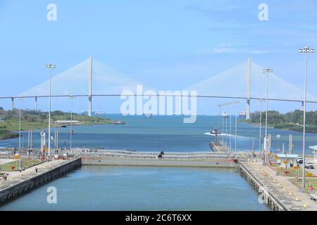 The Panama Canal is an artificial 48-mile (77 km) waterway in Panama that connects the Atlantic Ocean with the Pacific Ocean. Stock Photo