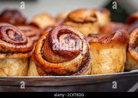 A display of pastries for sale on a market stall Stock Photo