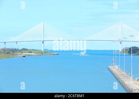 The Panama Canal is an artificial 48-mile (77 km) waterway in Panama that connects the Atlantic Ocean with the Pacific Ocean. Stock Photo