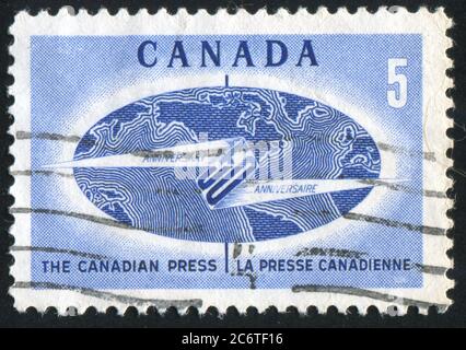 CANADA - CIRCA 1967: stamp printed by Canada, shows Globe and Flash, circa 1967 Stock Photo