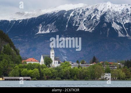 Lake Bled snow white mountains alps church Stock Photo